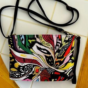 Painted leather crossbody purse.